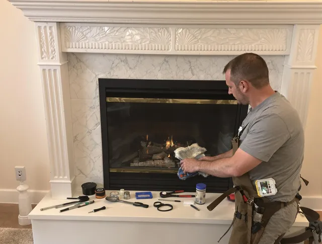 Bristol Chimney Sweep performing fireplace maintenance in Bristol, CT